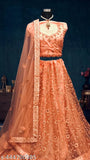 Buy Classic Peach Color Net Embroidered Semi Stitched Lehenga Choli With Semi-Stitched Blouse and Dupatta