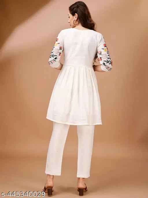 Off White colour multi thread embroidery flared tunic with trouser coord set